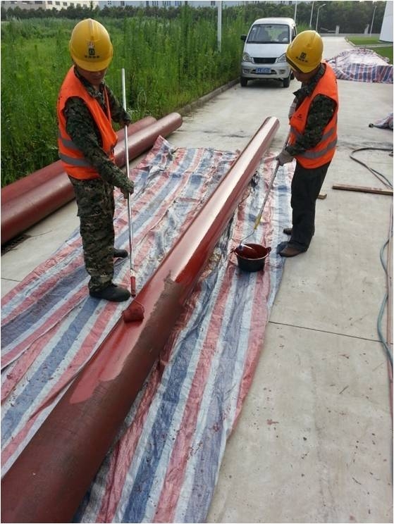 Pipe descaling and painting, welded openings